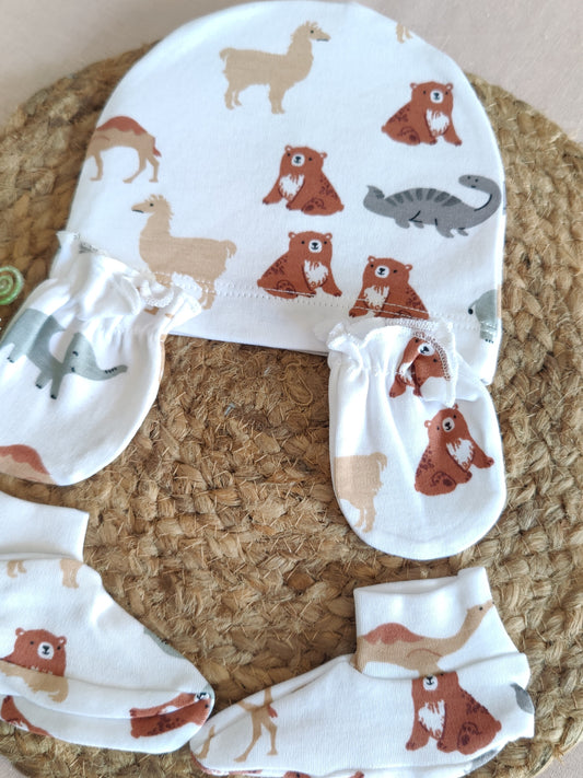 Organic cotton baby cap, mittens, and booties with animal pattern