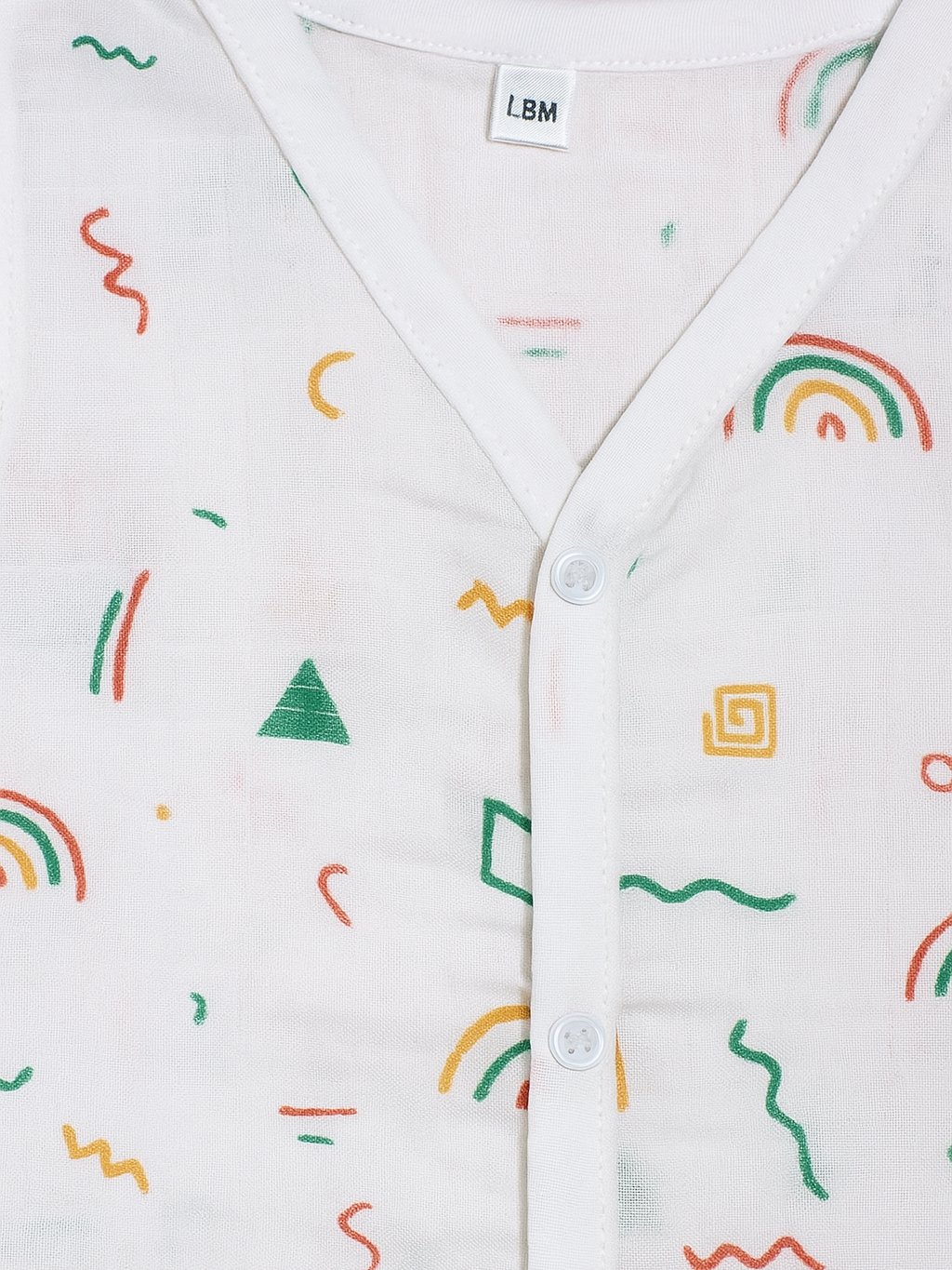White shirt with colorful geometric pattern