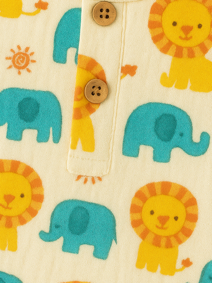 Children's clothing with lion and elephant pattern.
