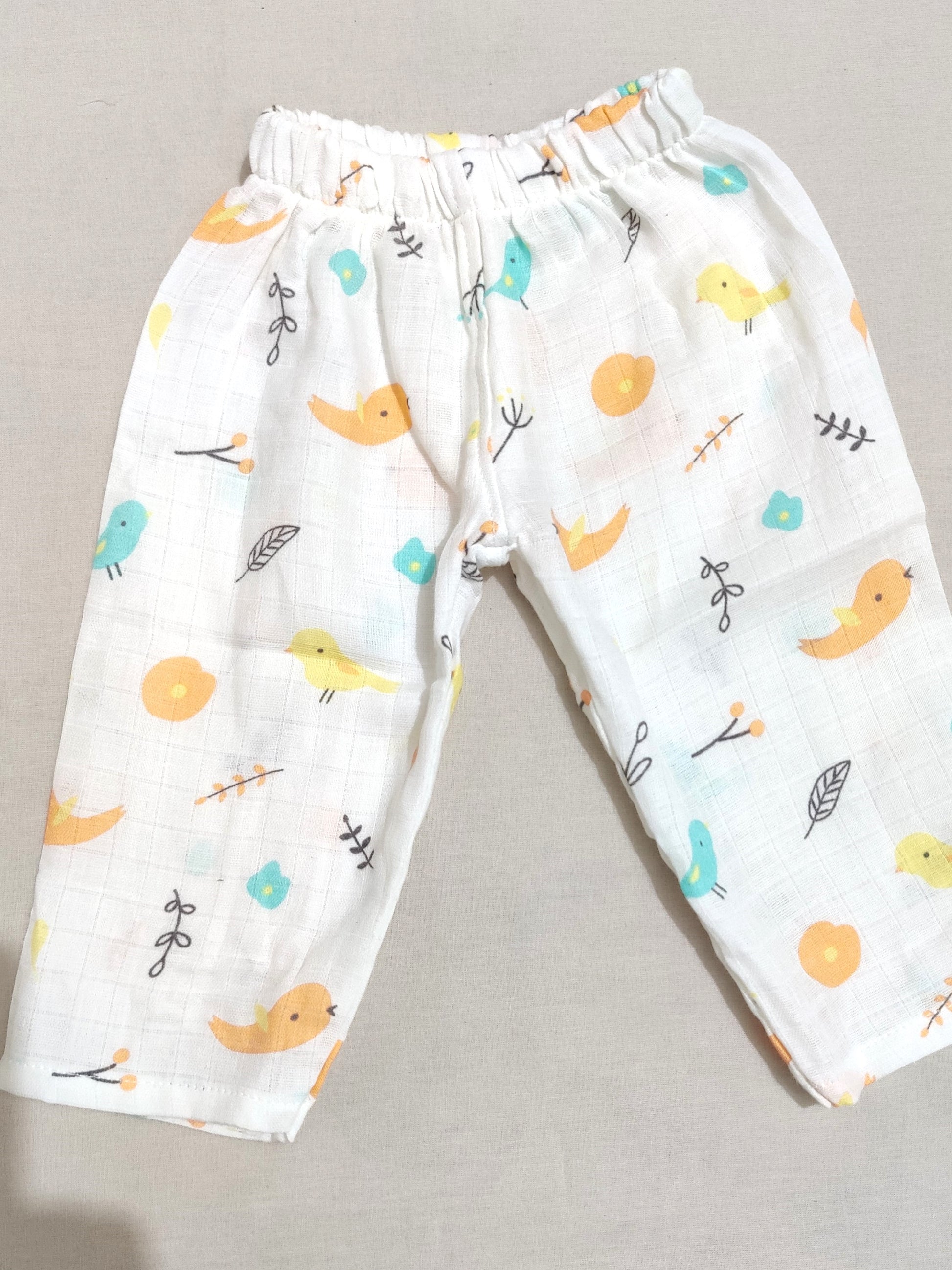organic muslin children's pants with colorful bird pattern 