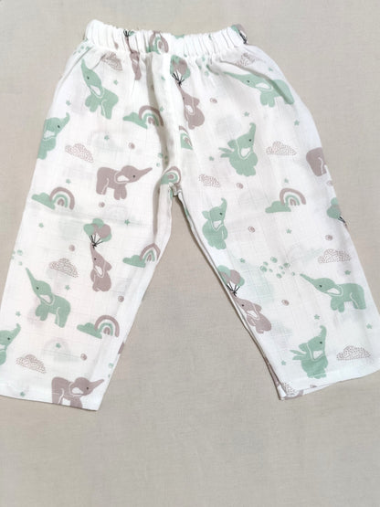 Children's pants with elephant and rainbow pattern.