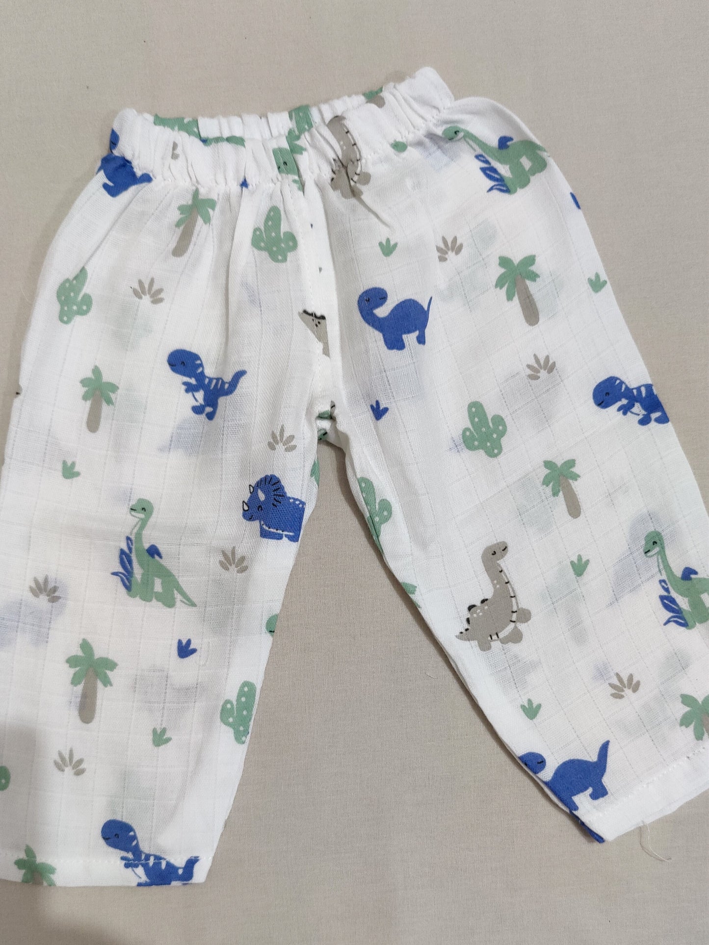 organic muslin pants with dinosaur pattern
