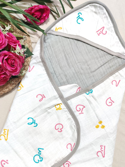 organic muslin baby hooded towel with playful motifs