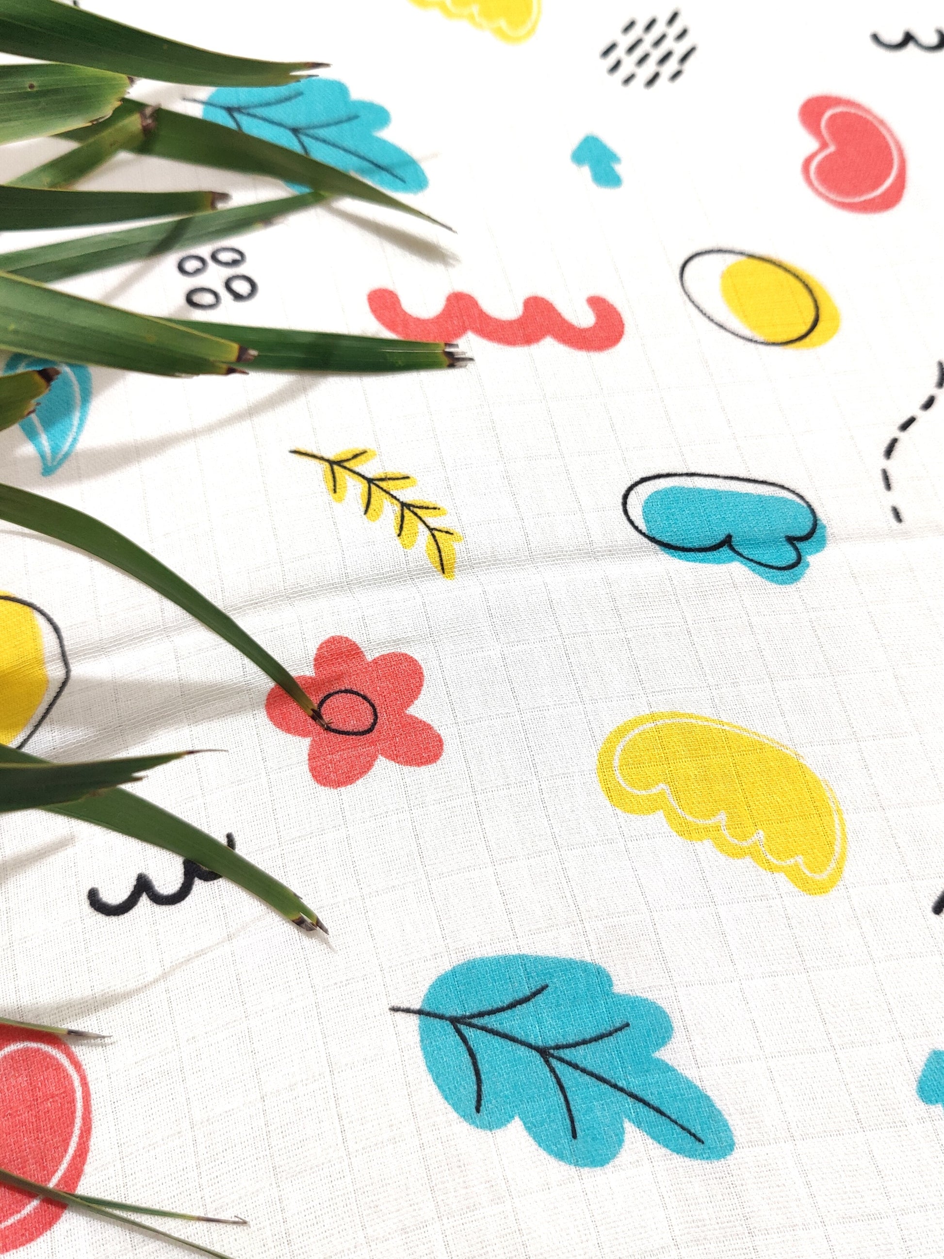 organic muslin swaddle with colorful print